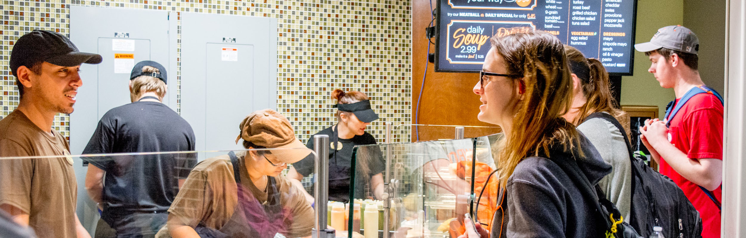 Student ordering at Bread & Beyond Deli Student ordering at Bread & Beyond Deli