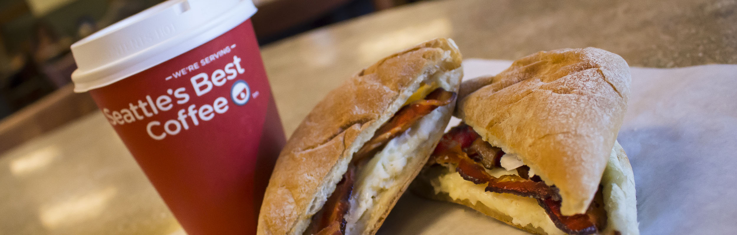 Coffee and breakfast sandwich at Cafe Libro Coffee and breakfast sandwich at Cafe Libro