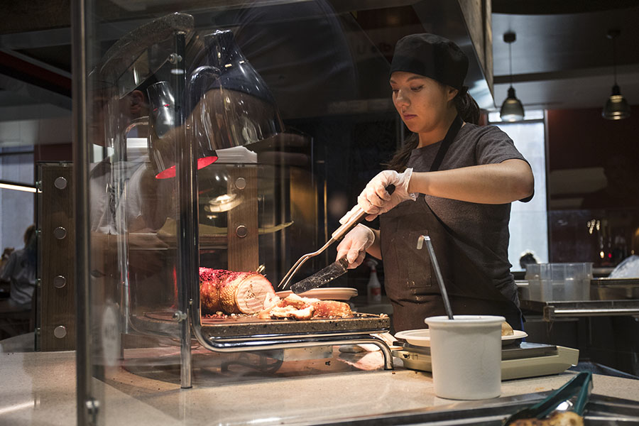 Dining employee working at Carvery