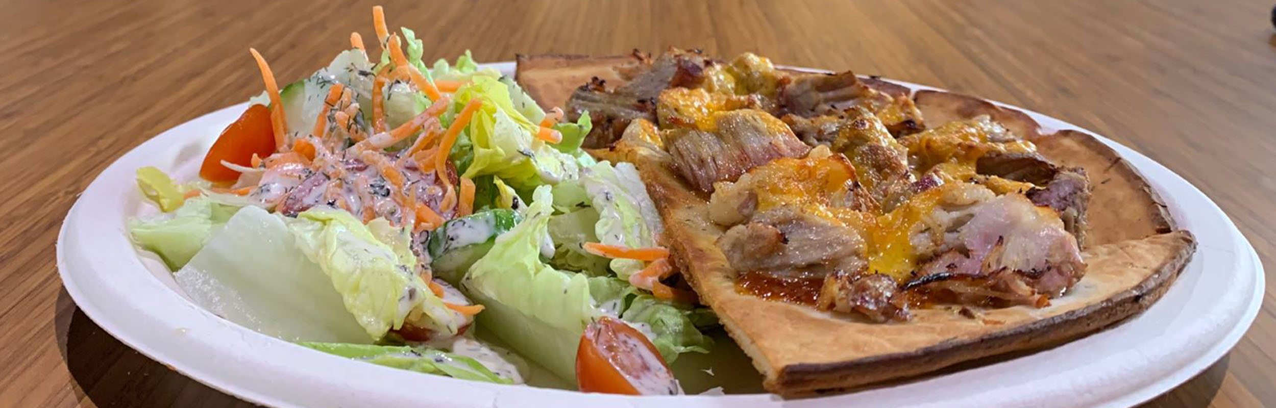 Gluten-friendly flatbread and salad at The Natural